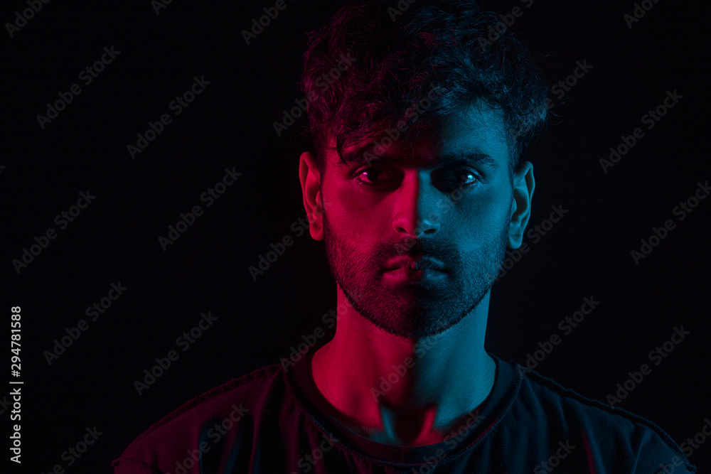 portrait of a man in red and blue portrait of a man in red and blue