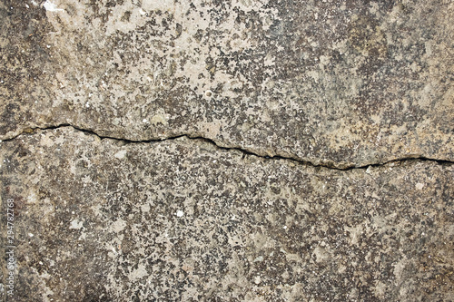 Cement cracked background, broun color.