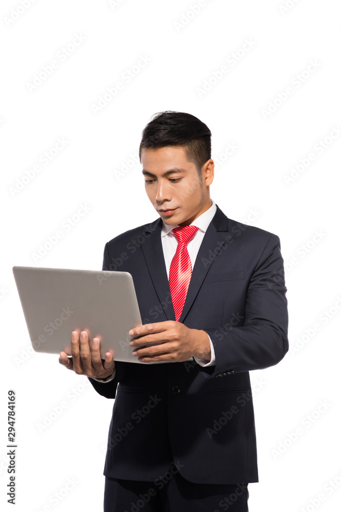 Asian business using laptop computer isolated on white background