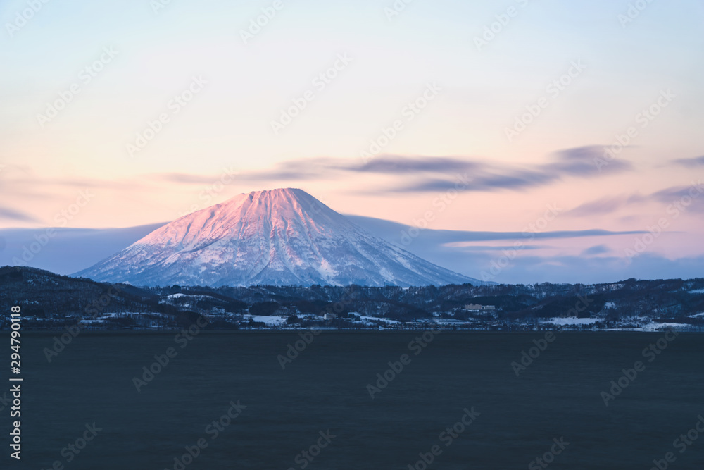 Toya lake on sunset and Yotei Mt. background.