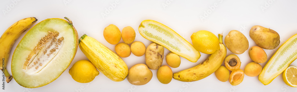 top view yellow season fruits and vegetables on white background