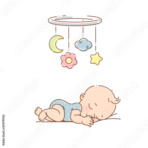 Little baby boy sleep under mobile toy.