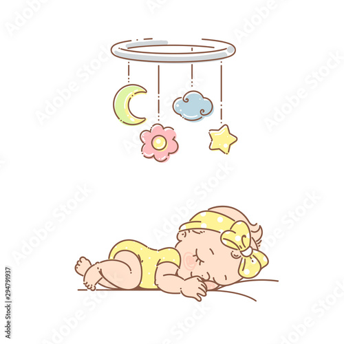 Little baby girl sleep under mobile toy. 