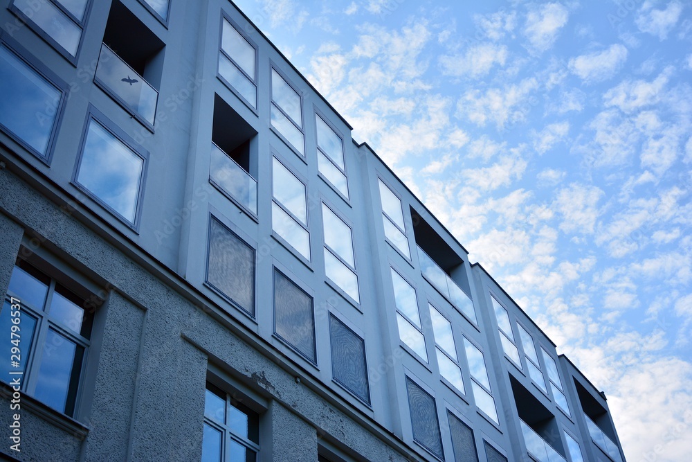 The windows of a modern building for offices. Business buildings architecture.