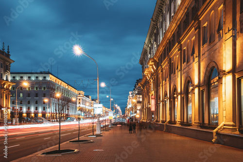 Minsk, Belarus. Traffic On Independence Avenue In Evening Night Illuminations photo