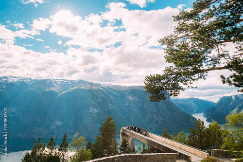 Aurlandsvangen, Norway. Tourists People Visiting Stegastein Viewpoint In Sogn And Fjordane Fjord. Amazing Summer Scenic View Of Sogn Og Fjordane. Famous Norwegian Landmark And Popular Destination photo