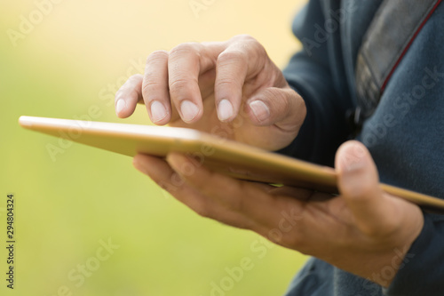 Picture of hand businessman using tablet, business to the next level through the world online