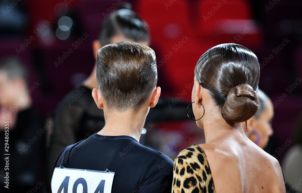 hairstyles of boys performing at the dance championship