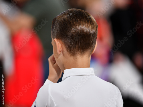 hairstyles of boys performing at the dance championship