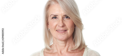 Close up portrait of a senior woman. Isolated