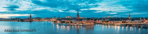 Stockholm, Sweden. Scenic View Of Stockholm Skyline At Summer Evening. Famous Popular Destination Place In Dusk Lights. Riddarholm Church In Night Lighting. Panorama Panoramic View