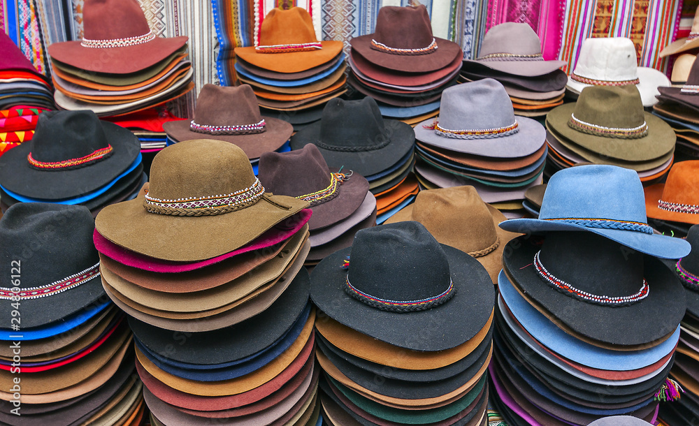 Street market selling hats and souvenirs in the touristic town of Cuzco in Perù