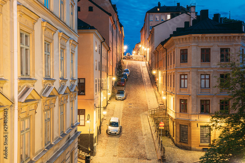 Stockholm  Sweden. Night View Of Traditional Stockholm Street. Residential Area  Cozy Street In Downtown. District Mullvaden First In Sodermalm. Cars Parked In Narrow Street.