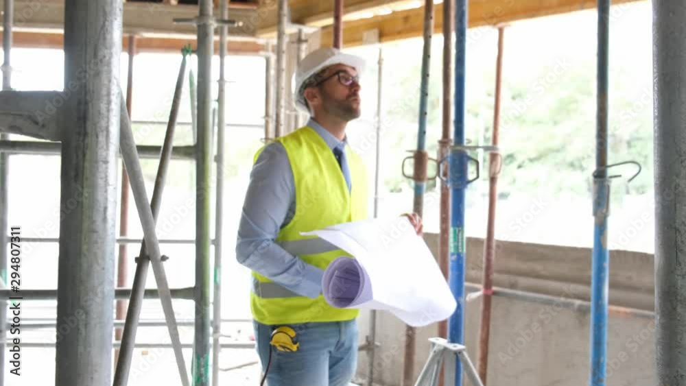 portrait of handsome foreman construction worker on a industrial building industry construction site 4 K 50 fps footage portrait of handsome foreman construction worker on a industrial building industry construction site 4 K 50 fps footage