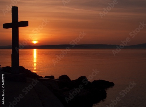 sea clouds sunset church red croatia