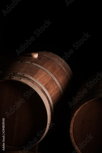 Wooden barrel in a dark cellar
