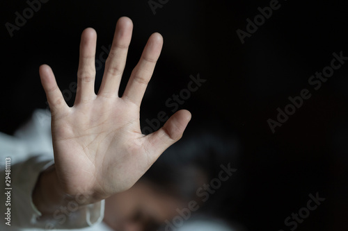 Women bondage lift hands against violence against women,international women's day