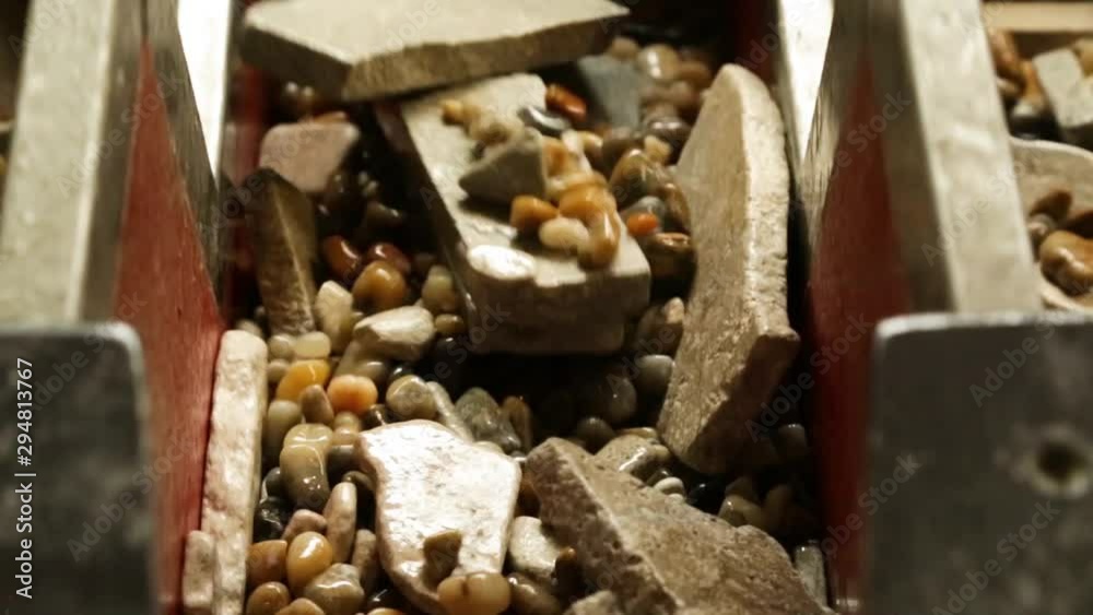 Natural stone processing and manufacturing plant. Pebbles and leftovers Natural stone processing and manufacturing plant. Pebbles and leftovers
