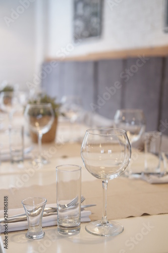 served table in a cafe, empty glasses, interior