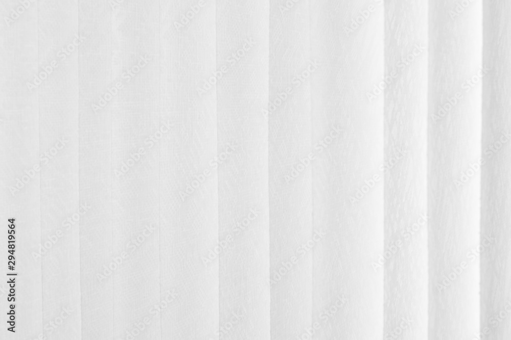 White curtain background abstract. Vertical pattern texture and sofe focus. Christmas, winter, new year concept for backdrop design. Flat lay, copy space
