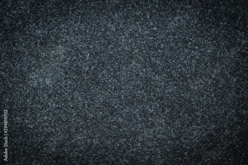 Black-grey of carpet texture background. Canvas fabric, seamless cloth texture backdrop with copy space.