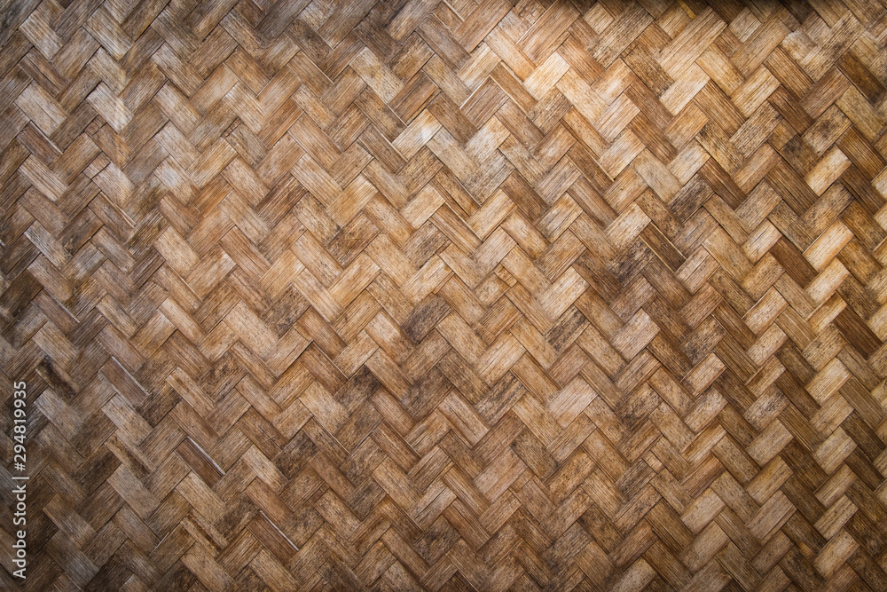 Texture of Old wall bamboo knit weave pattern nature background. Traditional handcraft weave structure, Design thai style. Texture of Old wall bamboo knit weave pattern nature background. Traditional handcraft weave structure, Design thai style.