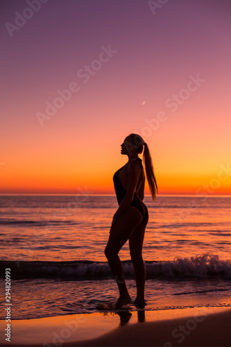 Blonde model on the sunset in Greece
