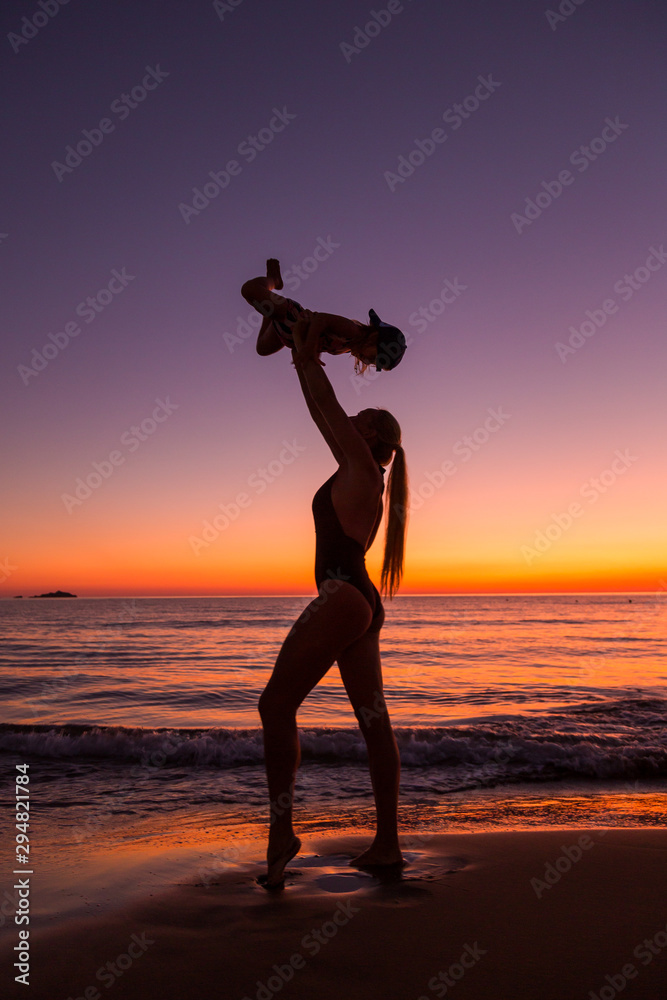 Mother and daughter at the sea