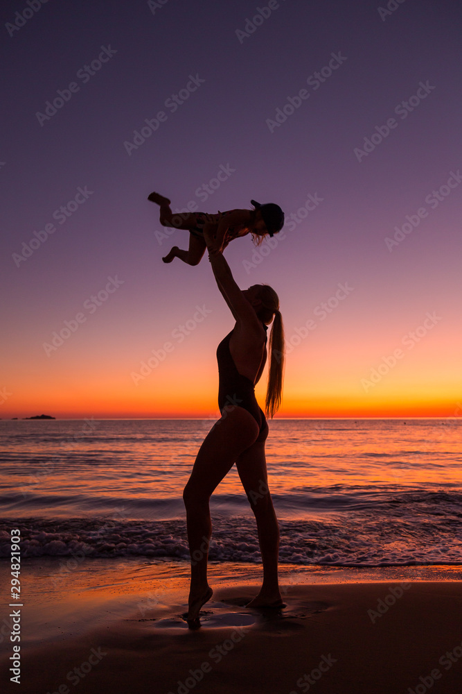 Mother and daughter at the sea