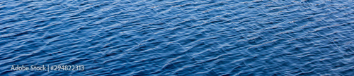 blue water surface with waves background