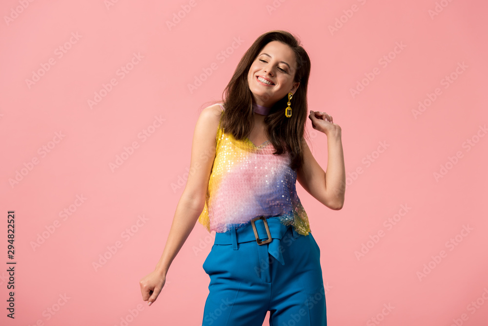 happy young stylish disco girl dancing isolated on pink happy young stylish disco girl dancing isolated on pink