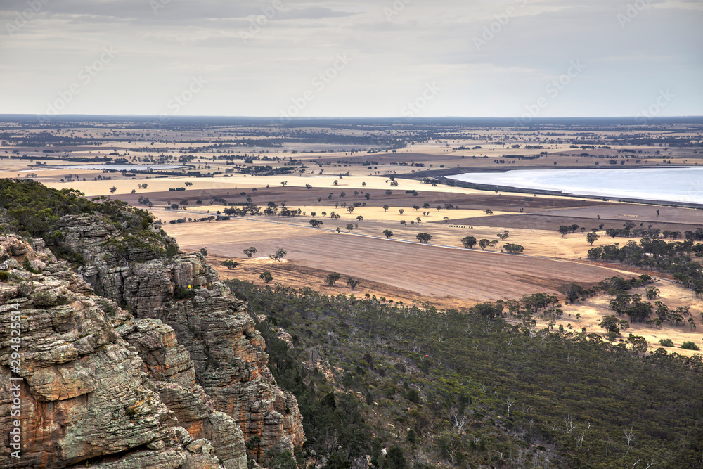 A view of the Wimmera wheat fields and the western plains of Victoria, Australia, from the top of Mount Arapiles, a world renowned rock climbing destination.