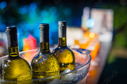 Wine bottles in icebucket