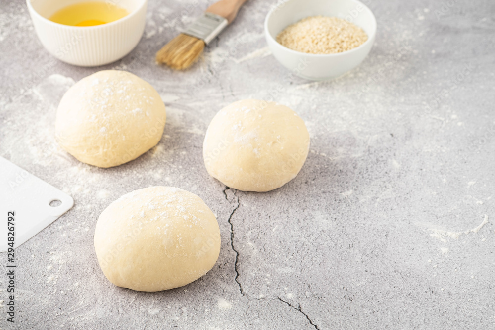 Dough pieces on the table in the kitchen. Copy space. Dough pieces on the table in the kitchen. Copy space.