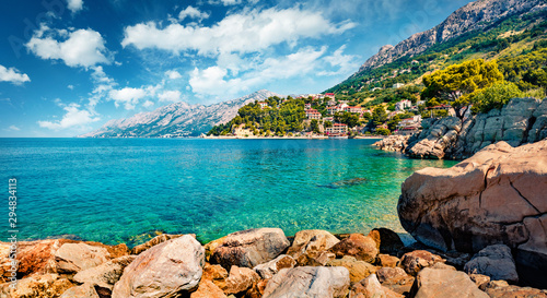 Splendid morning seascape of Adriatic sea. Sunny summer view of small beach i...