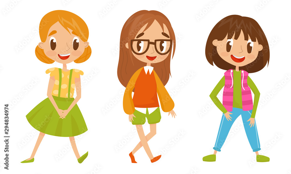 Young Smiling Girls Dressed In Different Clothes Happily Standing Isolated On White Background. Young Smiling Girls Dressed In Different Clothes Happily Standing Isolated On White Background.