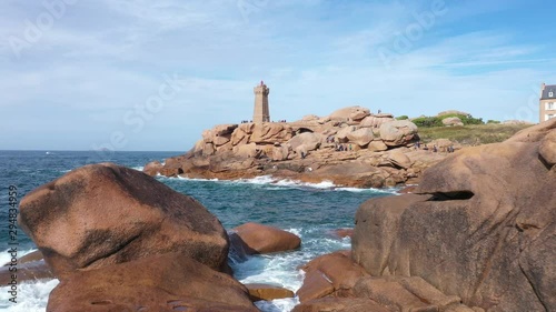 Aerial view of the Pink Granite Coast in northern Brittany on the municipality of Perros-Guirec, France, with the Ploumanach lighthouse, photo