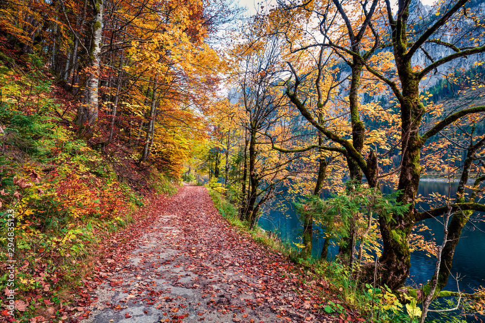 Moody autumn scene of Vorderer/Gosausee lake. Amazing morning view of Austrian Alps, Upper Austria, Europe. Beauty of nature concept background. Moody autumn scene of Vorderer/Gosausee lake. Amazing morning view of Austrian Alps, Upper Austria, Europe. Beauty of nature concept background.
