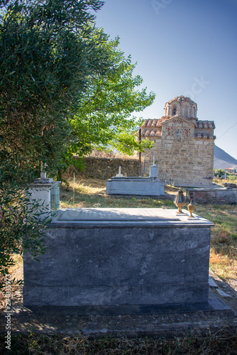 NOMITSI/ GREECE JULY 29, 2019: Church of Ag. Metamorphosis Sotiras in Nomitsi, Mani Greece photo
