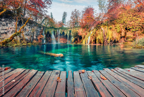 Amazing morning view of pure water waterfall in Plitvice National Park. Picturesque autumn scene of Croatia, Europe. Beauty of nature concept background.