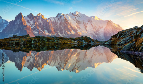 Exciting autumn view of Cheserys lake with Mount Blank on background, Chamonix location. Breathtaking outdoor scene of Vallon de Berard Nature Preserve, Alps, France, Europe. photo