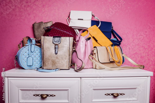Fashion women's handbags. White, blue lady bags. Set of beautiful leather handbags for your choice.