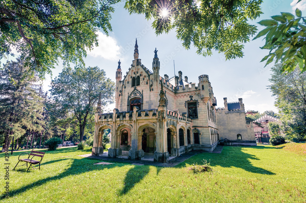 Fototapeta premium Sunny morning view of Sturdza castle. Splendid summer scene of the green park in Miclauseni monastery. Attractive landscape of Romania, Europe. Traveling concept background.