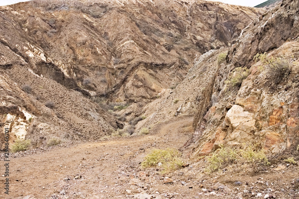 Panoramic view of an arid canyon path in Porto Santo (Madeira Islands, Portugal)