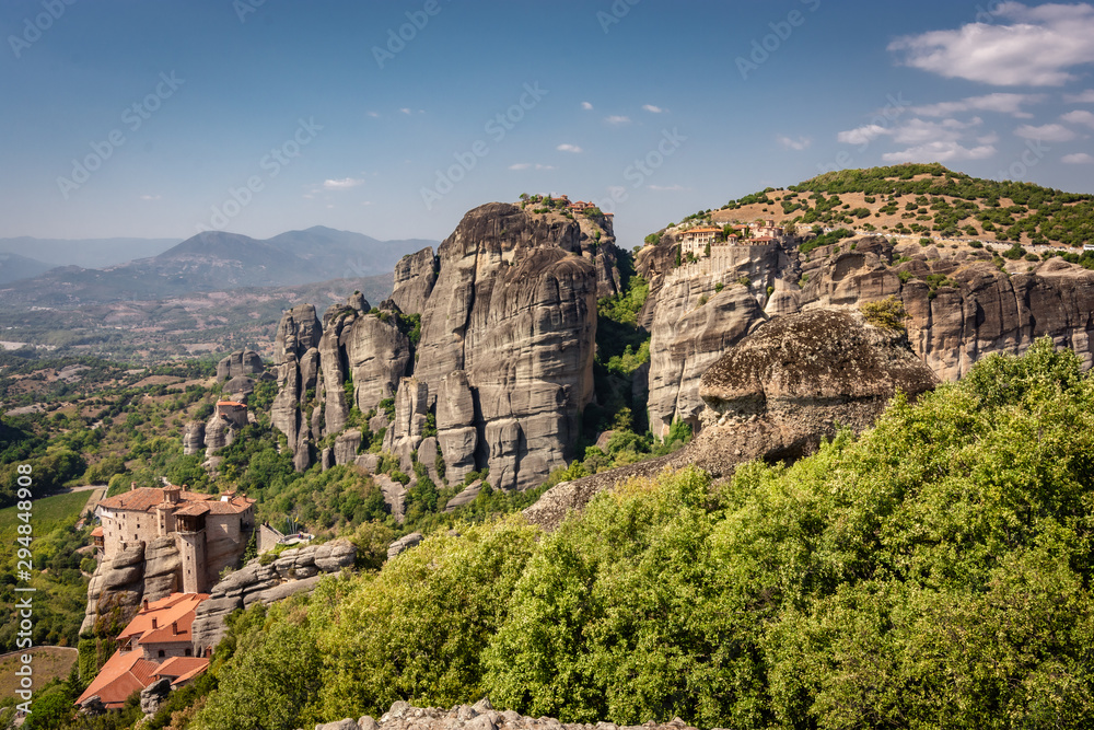 Meteora Monastery in Greece, built on rocks. Sunny day, blue sky. Meteora Monastery in Greece, built on rocks. Sunny day, blue sky.