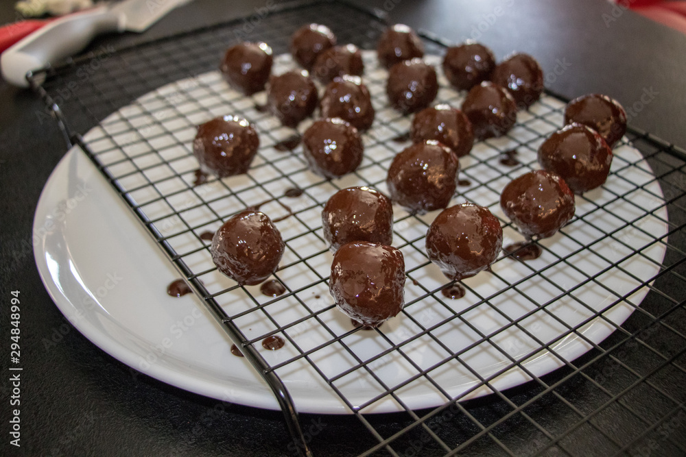 Fresh chocolate balls on kitchen counter Fresh chocolate balls on kitchen counter