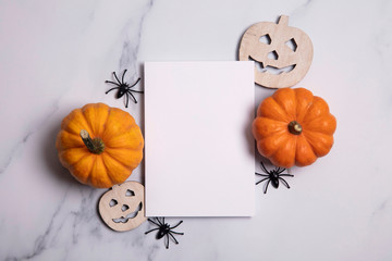 Blank white halloween card with pumpkins and spiders. Poster invitation mockup