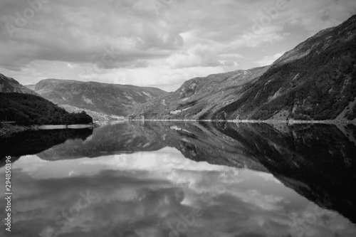 Norway lake reflection. Black and white vintage style.