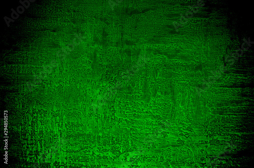 Abstract textured decorative stucco background in green colors.