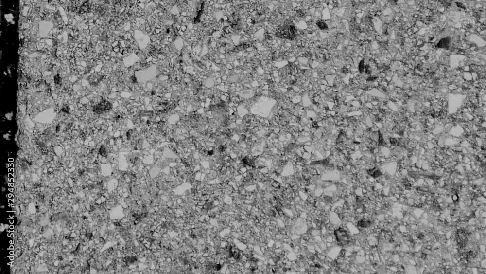 city street asphalt cracks - top view walking. short transition urban view. concrete background texture looping. city street asphalt cracks - top view walking. short transition urban view. concrete background texture looping.